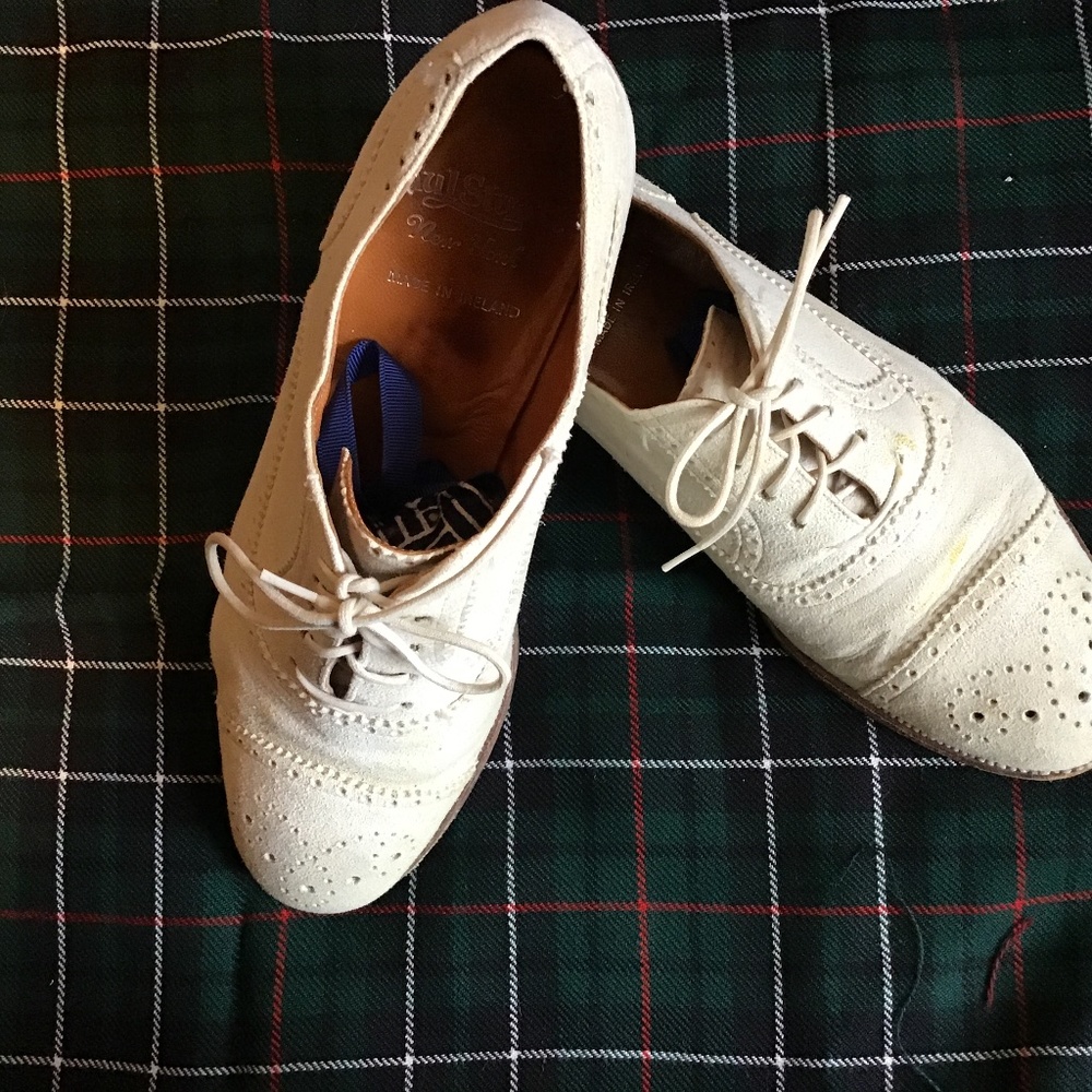 Vintage white suede wingtip Oxford shoes.